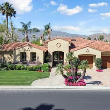 Buy this 4 bed house on Greg Norman Course Resort Course (PGA West) in Four Seasons Place, La Quinta