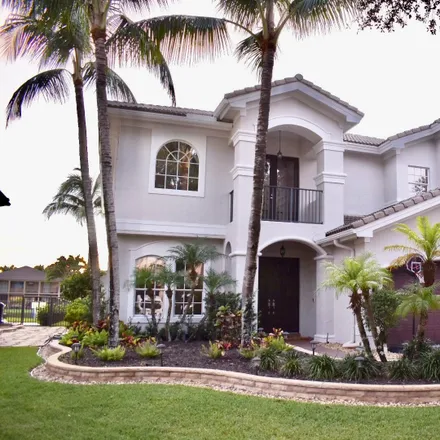 Rent this 5 bed house on 11393 Misty Ridge Way in Palm Beach County, FL 33473