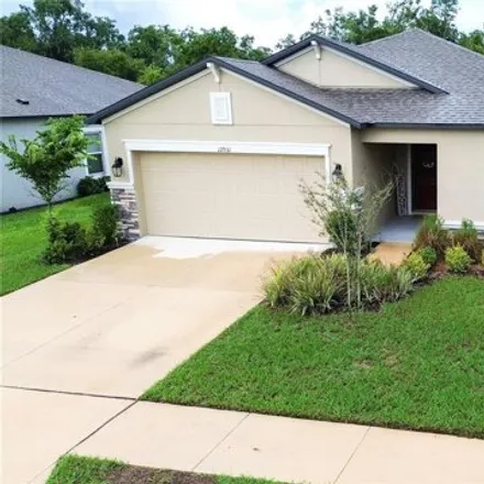 Buy this 3 bed house on 12931 Conquistador Loop in Spring Hill, Florida