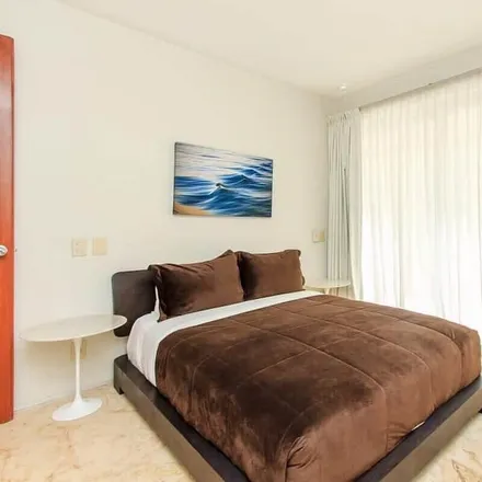 Rent this 4 bed condo on Playa del Carmen in Quintana Roo, Mexico