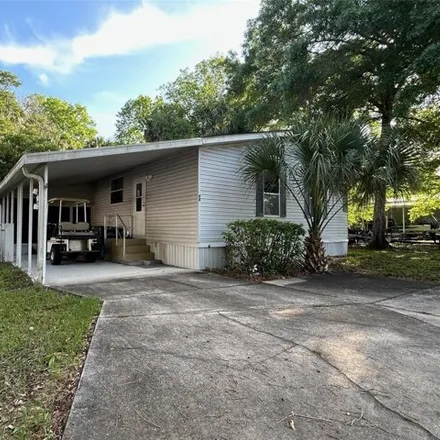 Buy this studio apartment on 63 Rosalie Oaks Boulevard in Polk County, FL 33898