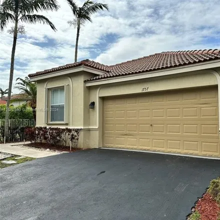 Buy this 4 bed house on 1757 Aspen Lane in Weston, FL 33327