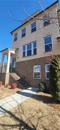 Rent this 4 bed townhouse on Commons Avenue in Woodstock, GA 30189