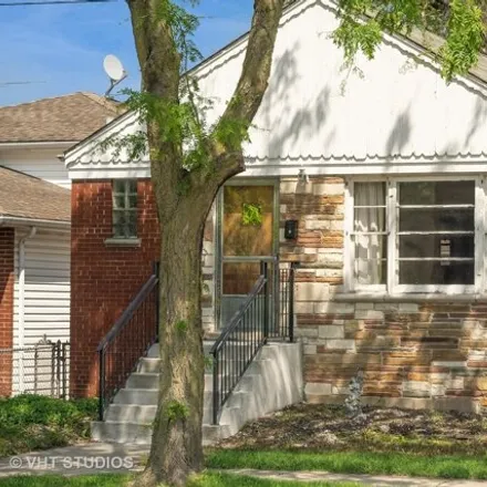 Buy this 2 bed house on 9349 South Woodlawn Avenue in Chicago, IL 60619