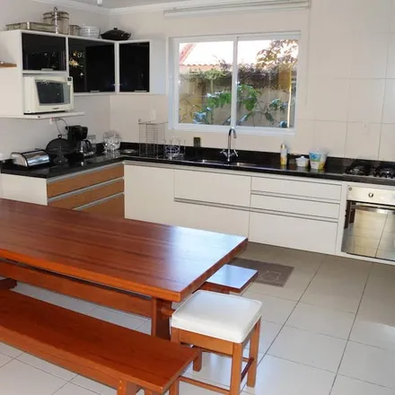 Rent this 4 bed townhouse on Canasvieiras in Florianópolis, Brazil