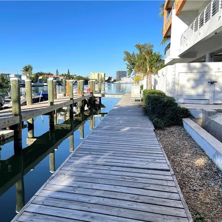 Rent this 2 bed townhouse on 7700 Tatum Waterway Drive in Miami Beach, FL 33141