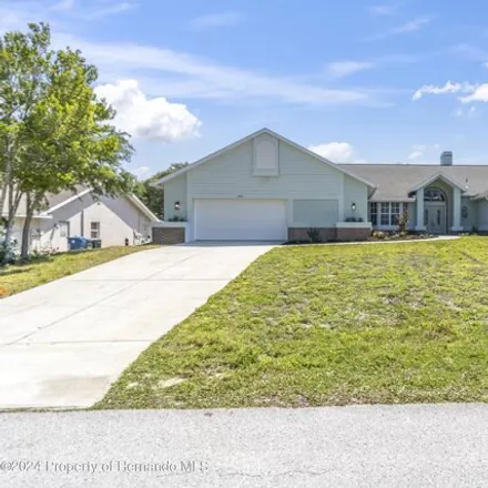 Buy this 5 bed house on 2438 Sunrise Court in Spring Hill, FL 34608