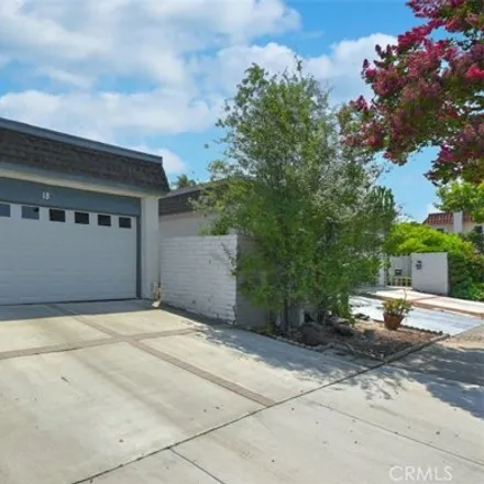 Rent this 3 bed house on 18 Queens Wreath Way in Irvine, CA 92612