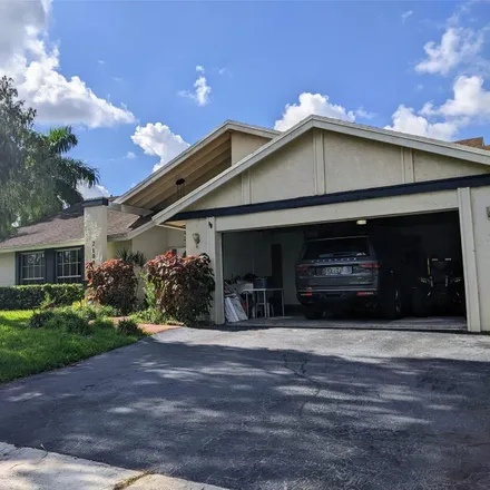 Rent this 3 bed house on 7100 Northwest 49th Court in Lauderhill, FL 33319