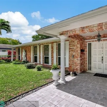 Buy this 4 bed house on 6324 Southwest 1st Street in Plantation, FL 33317