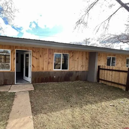 Buy this 2 bed townhouse on 150 South Washington Street in Cortez, CO 81321