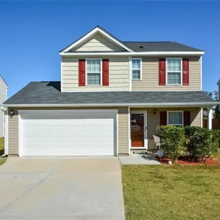 Buy this 3 bed house on 7136 Tanger Boulevard in Riverdale, GA 30296