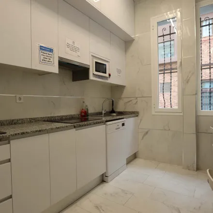 Rent this 16 bed room on Calle de Gijón in 28011 Madrid, Spain