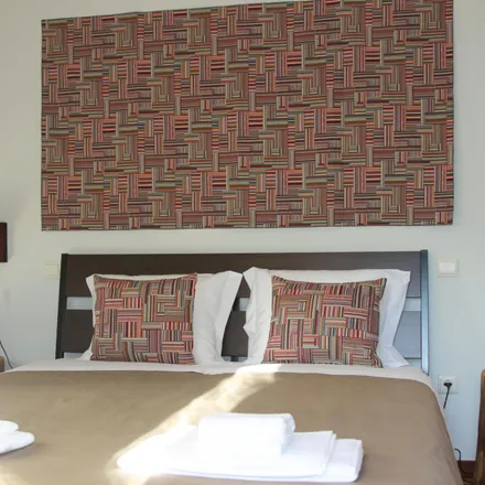 Rent this 8 bed room on Faria Guimarães in Rua António Cândido, 4200-291 Porto