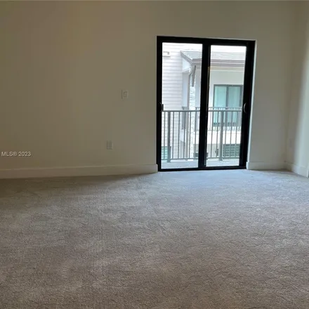 Rent this 3 bed apartment on Northwest 83rd Court in Doral, FL 33122
