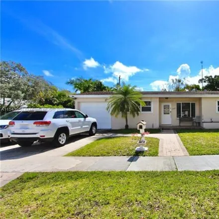 Rent this 4 bed house on 21011 Northeast 25th Court in Miami-Dade County, FL 33180