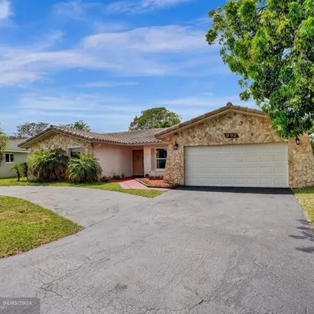 Buy this 3 bed house on 1004 Northwest 82nd Avenue in Coral Springs, FL 33071