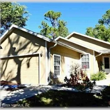 Buy this 3 bed house on 3167 Pine Tree Drive in Collier County, FL 34112