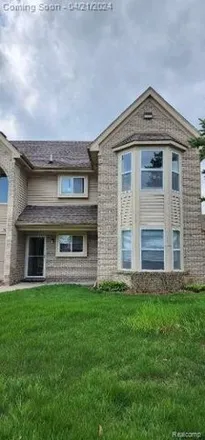 Rent this 2 bed condo on 15098 Northpointe Drive in Sterling Heights, MI 48313