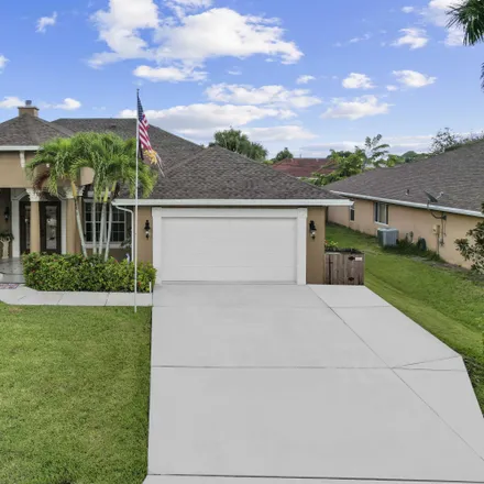 Buy this 5 bed house on 2533 Southwest Abney Street in Port Saint Lucie, FL 34953
