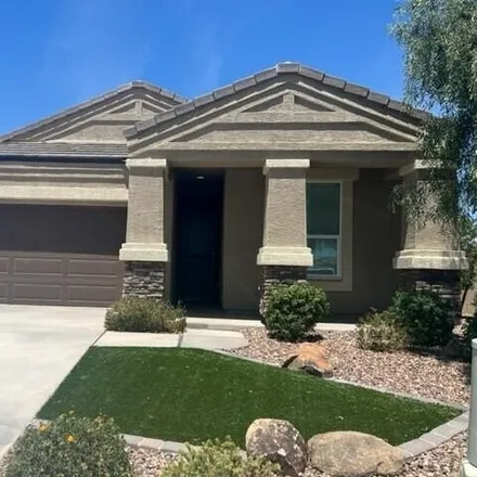 Rent this 4 bed house on West Desert Blossom Court in Florence, AZ 85132