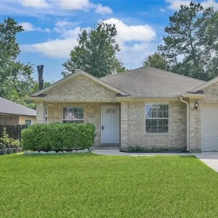 Rent this 3 bed house on 244 Longview Drive in Conroe, TX 77301