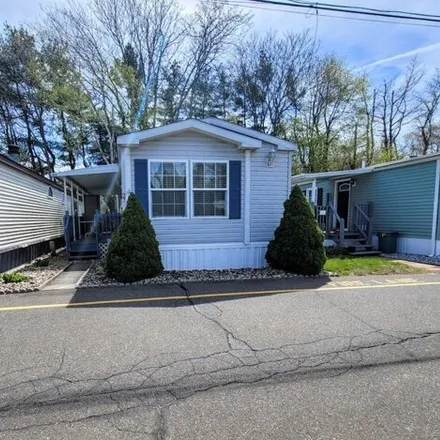 Buy this studio apartment on 74 Western Sands in Wallingford, CT 06492