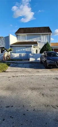 Buy this 4 bed townhouse on 5545 Northwest 194th Lane in Royal Country, Miami Gardens