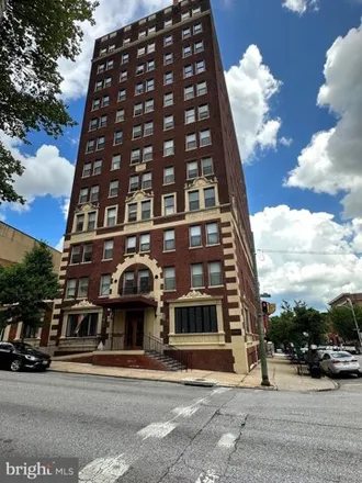 Rent this 1 bed condo on 1001 Liquors in East Eager Street, Baltimore