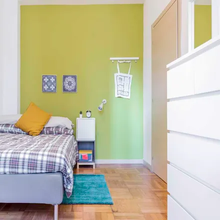 Rent this 4 bed room on Via Amatore Sciesa in 5, 20135 Milan MI