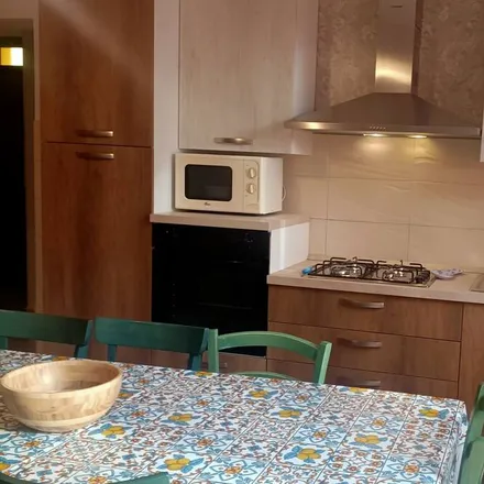 Rent this 4 bed house on 98021 Alì Terme