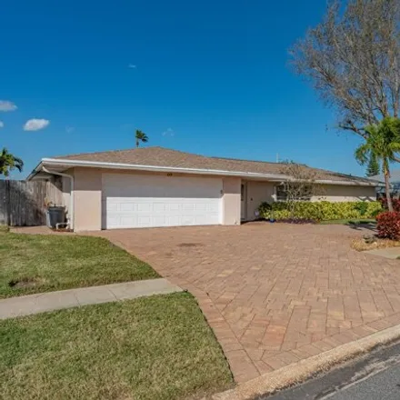 Buy this 4 bed house on 411 Saint Georges Court in South Patrick Shores, Brevard County