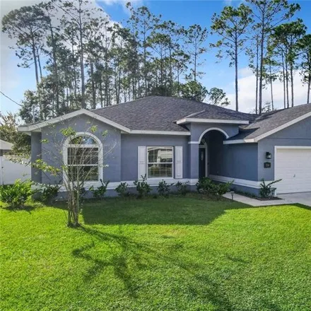 Image 1 - 240 Boulder Rock Drive, Palm Coast, FL 32137, USA - House for sale