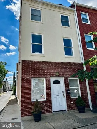 Rent this 3 bed townhouse on 2223 East Fayette Street in Baltimore, MD 21231