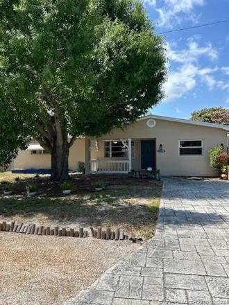 Rent this 3 bed house on 1584 Northeast Media Avenue in Jensen Beach, FL 34957