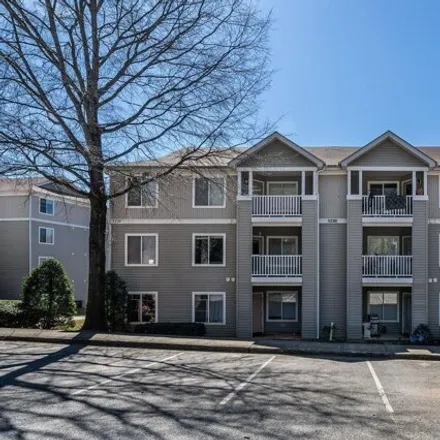 Rent this 4 bed condo on 1230 University Ct Apt 204 in Raleigh, North Carolina