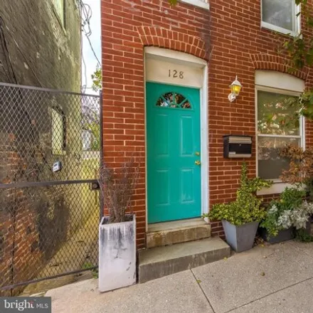 Rent this 3 bed house on 128 South Wolfe Street in Baltimore, MD 21231