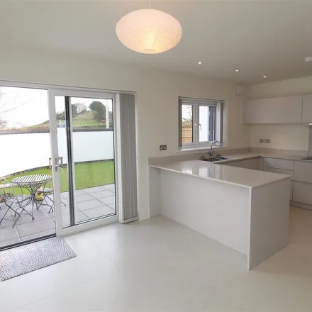 Rent this 3 bed apartment on 16 Leonard Avenue in London, SM4 6DW