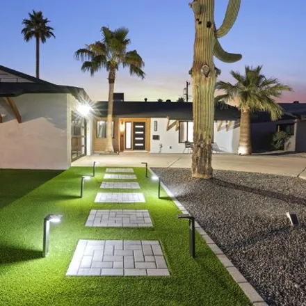 Buy this 4 bed house on 8650 East Jackrabbit Road in Scottsdale, AZ 85250