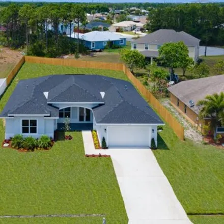 Buy this 4 bed house on 6188 West Deville Circle in Port Saint Lucie, FL 34986
