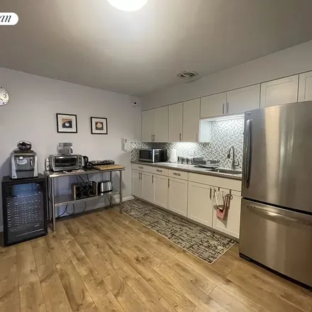 Rent this 1 bed apartment on 58-32 83rd Street in New York, NY 11379