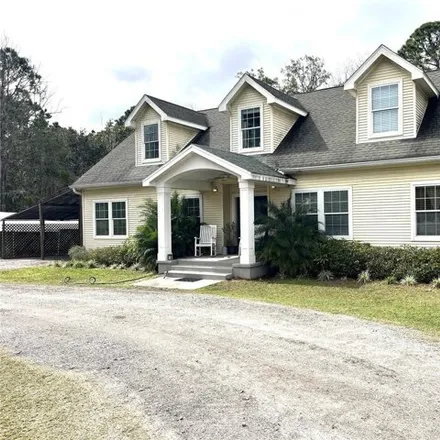 Buy this 5 bed townhouse on Kenton Road in Pasco County, FL 33544