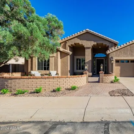 Buy this 4 bed house on 6811 East Winchcomb Drive in Scottsdale, AZ 85254