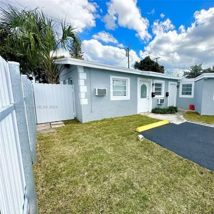 Buy this 6 bed house on 1501 East Sample Road in North Pompano Beach, Pompano Beach