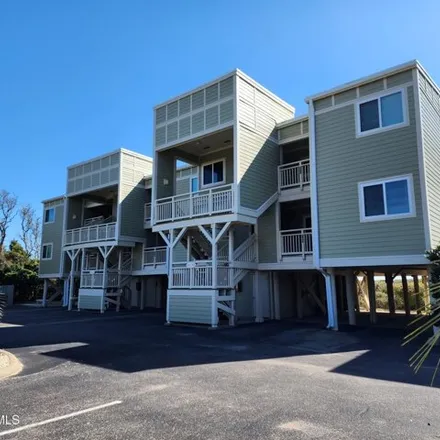 Buy this 2 bed condo on Oak Island Golf Club in 928 Caswell Beach Road, Caswell Beach