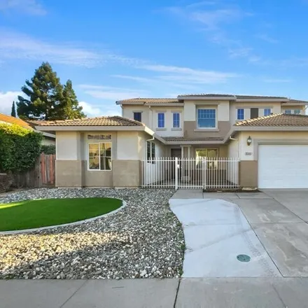 Buy this 4 bed house on 9589 Stone Springs Drive in Elk Grove, CA 95624