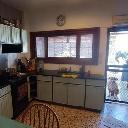 Buy this 4 bed house on 102 - Industria 4152 in Villa General Juan Gregorio de Las Heras, Villa Ballester