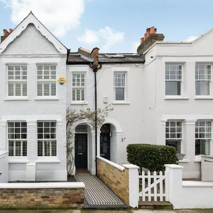 Rent this 4 bed townhouse on 31 First Avenue in London, SW14 8SP