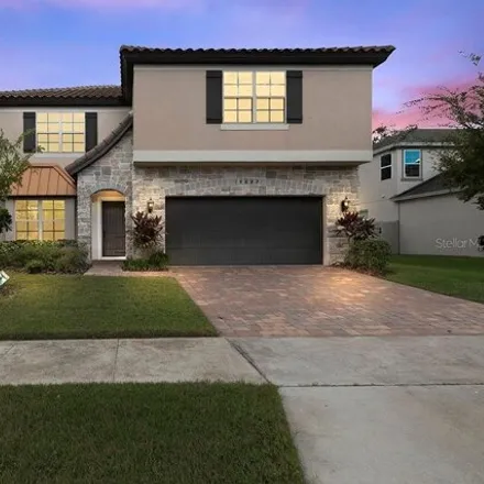 Rent this 5 bed house on 14855 Golden Sunburst Avenue in Orlando, FL 32827