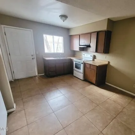 Rent this 2 bed apartment on 6440 East Alder Avenue in Mesa, AZ 85205